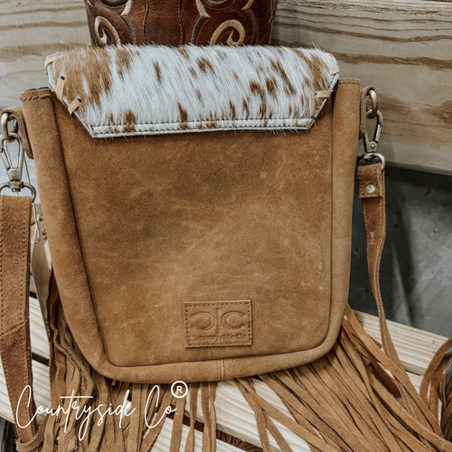 {{ brindle_boutique }} {{ online_boutique }} {{ jeans}} {{ brindle boutique }} {{ handbags }} {{ Native American jewelry }} {{ jewelry }} {{ cowhide}} {{ leather handbag}} {{ cowhide purse}} {{ turquoise}} {{ Navajo pearls }} {{ sterling silver}} {{ sterling silver pearls }} {{ necklace }} {{ bracelet }} {{ earrings }} {{ pendants }} {{ Navajo }} {{ cowhide tote }} {{ jeans }} {{ kan can }} {{ haute southern hyde }} {{ countryside co. }} {{ western }}