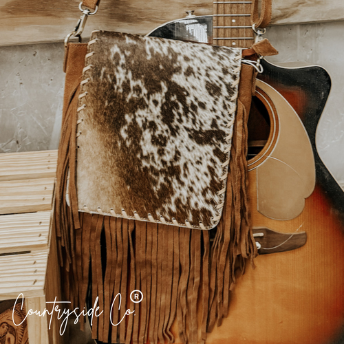 {{ brindle_boutique }} {{ online_boutique }} {{ jeans}} {{ brindle boutique }} {{ handbags }} {{ Native American jewelry }} {{ jewelry }} {{ cowhide}} {{ leather handbag}} {{ cowhide purse}} {{ turquoise}} {{ Navajo pearls }} {{ sterling silver}} {{ sterling silver pearls }} {{ necklace }} {{ bracelet }} {{ earrings }} {{ pendants }} {{ Navajo }} {{ cowhide tote }} {{ jeans }} {{ kan can }} {{ haute southern hyde }} {{ countryside co. }} {{ western }}