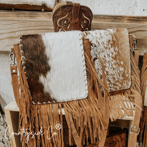 {{ brindle_boutique }} {{ online_boutique }} {{ jeans}} {{ brindle boutique }} {{ handbags }} {{ Native American jewelry }} {{ jewelry }} {{ cowhide}} {{ leather handbag}} {{ cowhide purse}} {{ turquoise}} {{ Navajo pearls }} {{ sterling silver}} {{ sterling silver pearls }} {{ necklace }} {{ bracelet }} {{ earrings }} {{ pendants }} {{ Navajo }} {{ cowhide tote }} {{ jeans }} {{ kan can }} {{ haute southern hyde }} {{ countryside co. }} {{ western }}