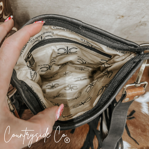 {{ brindle_boutique }} {{ online_boutique }} {{ jeans}} {{ brindle boutique }} {{ handbags }} {{ Native American jewelry }} {{ jewelry }} {{ cowhide}} {{ leather handbag}} {{ cowhide purse}} {{ turquoise}} {{ Navajo pearls }} {{ sterling silver}} {{ sterling silver pearls }} {{ necklace }} {{ bracelet }} {{ earrings }} {{ pendants }} {{ Navajo }} {{ cowhide tote }} {{ jeans }} {{ kan can }} {{ haute southern hyde }} {{ countryside co. }} {{ western }}
