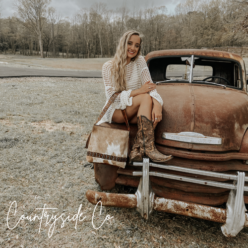 {{ brindle_boutique }} {{ online_boutique }} {{ jeans}} {{ brindle boutique }} {{ handbags }} {{ Native American jewelry }} {{ jewelry }} {{ cowhide}} {{ leather handbag}} {{ cowhide purse}} {{ turquoise}} {{ Navajo pearls }} {{ sterling silver}} {{ sterling silver pearls }} {{ necklace }} {{ bracelet }} {{ earrings }} {{ pendants }} {{ Navajo }} {{ cowhide tote }} {{ jeans }} {{ kan can }} {{ haute southern hyde }} {{ countryside co. }} {{ western }}