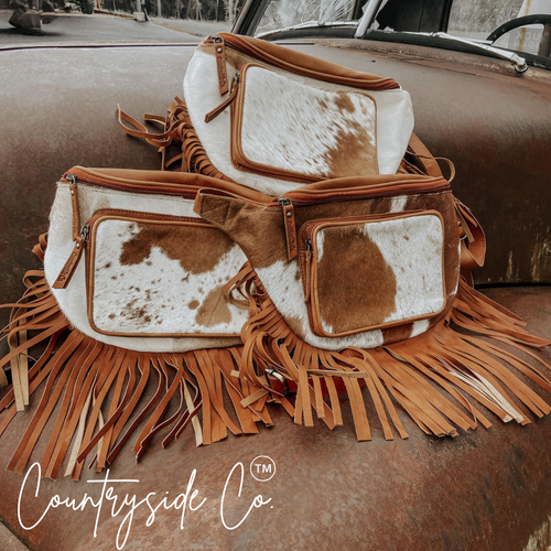 {{ brindle_boutique }} {{ online_boutique }} {{ jeans}} {{ brindle boutique }} {{ handbags }} {{ Native American jewelry }} {{ jewelry }} {{ cowhide}} {{ leather handbag}} {{ cowhide purse}} {{ turquoise}} {{ Navajo pearls }} {{ sterling silver}} {{ sterling silver pearls }} {{ necklace }} {{ bracelet }} {{ earrings }} {{ pendants }} {{ Navajo }} {{ cowhide tote }} {{ jeans }} {{ kan can }} {{ haute southern hyde }} {{ countryside co. }} {{ western }}
