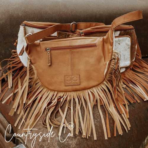 {{ brindle_boutique }} {{ online_boutique }} {{ jeans}} {{ brindle boutique }} {{ handbags }} {{ Native American jewelry }} {{ jewelry }} {{ cowhide}} {{ leather handbag}} {{ cowhide purse}} {{ turquoise}} {{ Navajo pearls }} {{ sterling silver}} {{ sterling silver pearls }} {{ necklace }} {{ bracelet }} {{ earrings }} {{ pendants }} {{ Navajo }} {{ cowhide tote }} {{ jeans }} {{ kan can }} {{ haute southern hyde }} {{ countryside co. }} {{ western }}