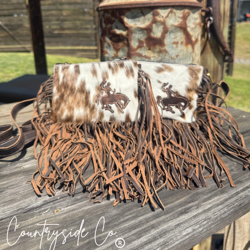 {{ brindle_boutique }} {{ online_boutique }} {{ jeans}} {{ brindle boutique }} {{ handbags }} {{ Native American jewelry }} {{ jewelry }} {{ cowhide}} {{ leather handbag}} {{ cowhide purse}} {{ turquoise}} {{ Navajo pearls }} {{ sterling silver}} {{ sterling silver pearls }} {{ necklace }} {{ bracelet }} {{ earrings }} {{ pendants }} {{ Navajo }} {{ cowhide tote }} {{ jeans }} {{ kan can }} {{ haute southern hyde }} {{ countryside co. }} {{ western }}