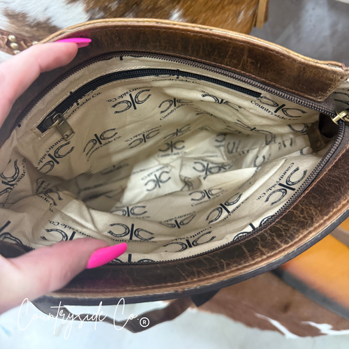 {{ brindle_boutique }} {{ online_boutique }} {{ jeans}} {{ brindle boutique }} {{ handbags }} {{ Native American jewelry }} {{ jewelry }} {{ cowhide}} {{ leather handbag}} {{ cowhide purse}} {{ turquoise}} {{ Navajo pearls }} {{ sterling silver}} {{ sterling silver pearls }} {{ necklace }} {{ bracelet }} {{ earrings }} {{ pendants }} {{ Navajo }} {{ cowhide tote }} {{ jeans }} {{ kan can }} {{ haute southern hyde }} {{ countryside co. }} {{ western }}