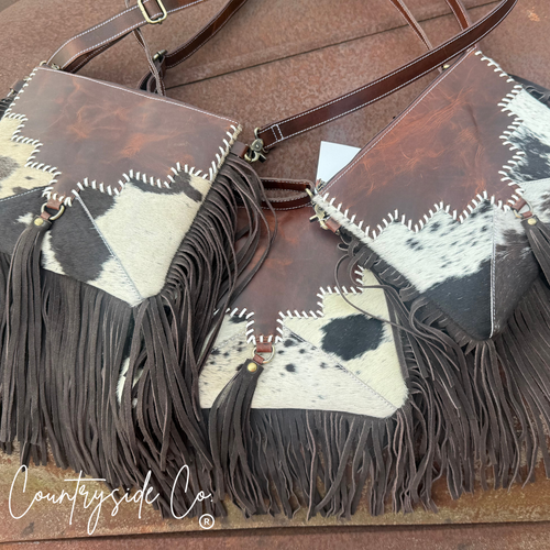 {{ brindle_boutique }} {{ online_boutique }} {{ jeans}} {{ brindle boutique }} {{ handbags }} {{ Native American jewelry }} {{ jewelry }} {{ cowhide}} {{ leather handbag}} {{ cowhide purse}} {{ turquoise}} {{ Navajo pearls }} {{ sterling silver}} {{ sterling silver pearls }} {{ necklace }} {{ bracelet }} {{ earrings }} {{ pendants }} {{ Navajo }} {{ cowhide tote }} {{ jeans }} {{ kan can }} {{ haute southern hyde }} {{ countryside co. }} {{ western }}