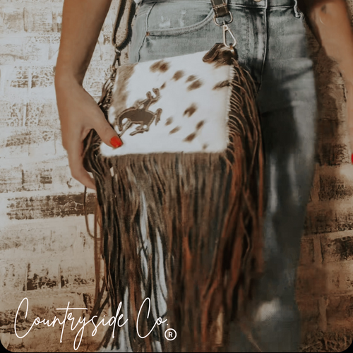 {{ brindle_boutique }} {{ online_boutique }} {{ jeans}} {{ brindle boutique }} {{ handbags }} {{ Native American jewelry }} {{ jewelry }} {{ cowhide}} {{ leather handbag}} {{ cowhide purse}} {{ turquoise}} {{ Navajo pearls }} {{ sterling silver}} {{ sterling silver pearls }} {{ necklace }} {{ bracelet }} {{ earrings }} {{ pendants }} {{ Navajo }} {{ cowhide tote }} {{ jeans }} {{ kan can }} {{ haute southern hyde }} {{ countryside co. }} {{ western }}