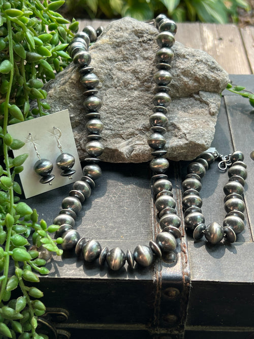 {{ brindle_boutique }} {{ online_boutique }} {{ jeans}} {{ brindle boutique }} {{ handbags }} {{ Native American jewelry }} {{ jewelry }} {{ cowhide}} {{ leather handbag}} {{ cowhide purse}} {{ turquoise}} {{ Navajo pearls }} {{ sterling silver}} {{ sterling silver pearls }} {{ necklace }} {{ bracelet }} {{ earrings }} {{ pendants }} {{ Navajo }} {{ cowhide tote }} {{ jeans }} {{ kan can }} {{ haute southern hyde }} {{ countryside co. }} {{ western }}