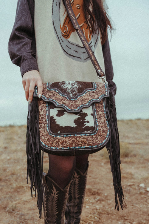 {{ brindle_boutique }} {{ online_boutique }} {{ jeans}} {{ brindle boutique }} {{ handbags }} {{ Native American jewelry }} {{ jewelry }} {{ cowhide}} {{ leather handbag}} {{ cowhide purse}} {{ turquoise}} {{ Navajo pearls }} {{ sterling silver}} {{ sterling silver pearls }} {{ necklace }} {{ bracelet }} {{ earrings }} {{ pendants }} {{ Navajo }} {{ cowhide tote }} {{ jeans }} {{ kan can }} {{ haute southern hyde }} {{ countryside co. }} {{ western }}