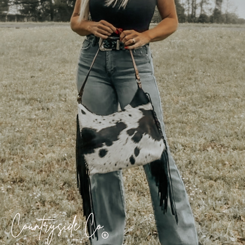 {{ brindle_boutique }} {{ online_boutique }} {{ jeans}} {{ brindle boutique }} {{ handbags }} {{ Native American jewelry }} {{ jewelry }} {{ cowhide}} {{ leather handbag}} {{ cowhide purse}} {{ turquoise}} {{ Navajo pearls }} {{ sterling silver}} {{ sterling silver pearls }} {{ necklace }} {{ bracelet }} {{ earrings }} {{ pendants }} {{ Navajo }} {{ cowhide tote }} {{ jeans }} {{ kan can }} {{ haute southern hyde }} {{ countryside co. }} {{ western }}