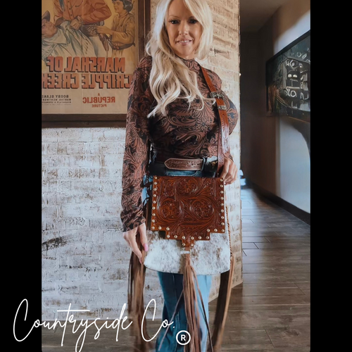 {{ brindle_boutique }} {{ online_boutique }} {{ jeans}} {{ brindle boutique }} {{ handbags }} {{ Native American jewelry }} {{ jewelry }} {{ cowhide}} {{ leather handbag}} {{ cowhide purse}} {{ turquoise}} {{ Navajo pearls }} {{ sterling silver}} {{ sterling silver pearls }} {{ necklace }} {{ bracelet }} {{ earrings }} {{ pendants }} {{ Navajo }} {{ cowhide tote }} {{ jeans }} {{ kan can }} {{ haute southern hyde }} {{ countryside co. }} {{ western }}