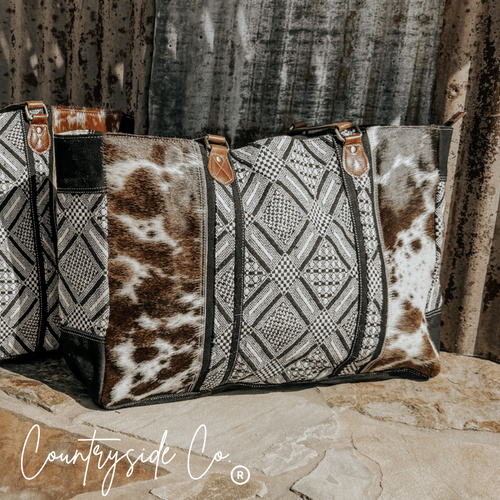 {{ brindle_boutique }} {{ online_boutique }} {{ jeans}} {{ brindle boutique }} {{ handbags }} {{ Native American jewelry }} {{ jewelry }} {{ cowhide}} {{ leather handbag}} {{ cowhide purse}} {{ turquoise}} {{ Navajo pearls }} {{ sterling silver}} {{ sterling silver pearls }} {{ necklace }} {{ bracelet }} {{ earrings }} {{ pendants }} {{ Navajo }} {{ cowhide tote }} {{ jeans }} {{ kan can }} {{ haute southern hyde }} {{ countryside co. }} {{ western }}