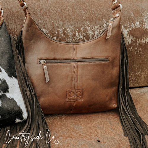 {{ brindle_boutique }} {{ online_boutique }} {{ jeans}} {{ brindle boutique }} {{ handbags }} {{ Native American jewelry }} {{ jewelry }} {{ cowhide}} {{ leather handbag}} {{ cowhide purse}} {{ turquoise}} {{ Navajo pearls }} {{ sterling silver}} {{ sterling silver pearls }} {{ necklace }} {{ bracelet }} {{ earrings }} {{ pendants }} {{ Navajo }} {{ cowhide tote }} {{ jeans }} {{ kan can }} {{ haute southern hyde }} {{ countryside co. }} {{ western }}