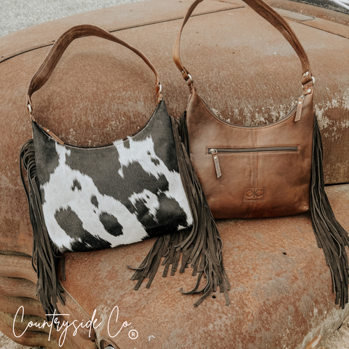 {{ brindle_boutique }} {{ online_boutique }} {{ jeans}} {{ brindle boutique }} {{ handbags }} {{ Native American jewelry }} {{ jewelry }} {{ cowhide}} {{ leather handbag}} {{ cowhide purse}} {{ turquoise}} {{ Navajo pearls }} {{ sterling silver}} {{ sterling silver pearls }} {{ necklace }} {{ bracelet }} {{ earrings }} {{ pendants }} {{ Navajo }} {{ cowhide tote }} {{ jeans }} {{ kan can }} {{ haute southern hyde }} {{ countryside co. }} {{ western }}