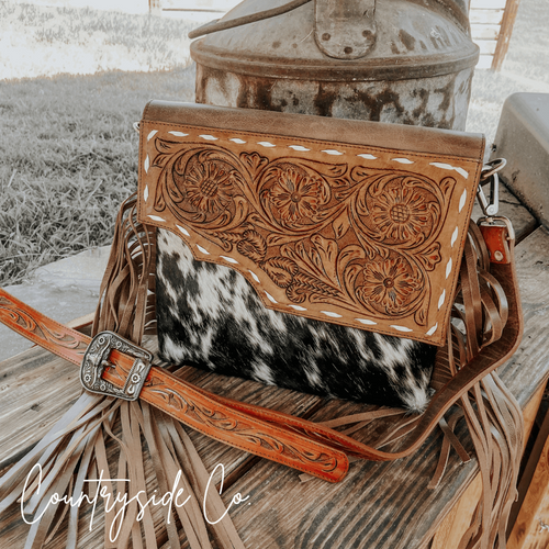 {{ brindle_boutique }} {{ online_boutique }} {{ jeans}} {{ brindle boutique }} {{ handbags }} {{ Native American jewelry }} {{ jewelry }} {{ cowhide}} {{ leather handbag}} {{ cowhide purse}} {{ turquoise}} {{ Navajo pearls }} {{ sterling silver}} {{ sterling silver pearls }} {{ necklace }} {{ bracelet }} {{ earrings }} {{ pendants }} {{ Navajo }} {{ cowhide tote }} {{ jeans }} {{ kan can }} {{ haute southern hyde }} {{ countryside co. }} {{ western }}