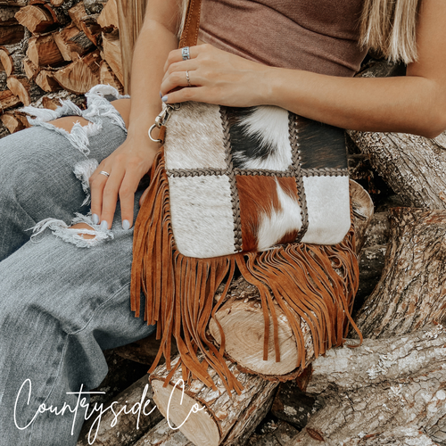 {{ brindle_boutique }} {{ online_boutique }} {{ jeans}} {{ brindle boutique }} {{ handbags }} {{ Native American jewelry }} {{ jewelry }} {{ cowhide}} {{ leather handbag}} {{ cowhide purse}} {{ turquoise}} {{ Navajo pearls }} {{ sterling silver}} {{ sterling silver pearls }} {{ necklace }} {{ bracelet }} {{ earrings }} {{ pendants }} {{ Navajo }} {{ cowhide tote }} {{ jeans }} {{ kan can }} {{ haute southern hyde }} {{ countryside co. }} {{ western }}