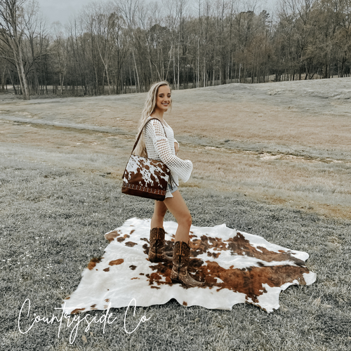 {{ brindle_boutique }} {{ online_boutique }} {{ jeans}} {{ brindle boutique }} {{ handbags }} {{ Native American jewelry }} {{ jewelry }} {{ cowhide}} {{ leather handbag}} {{ cowhide purse}} {{ turquoise}} {{ Navajo pearls }} {{ sterling silver}} {{ sterling silver pearls }} {{ necklace }} {{ bracelet }} {{ earrings }} {{ pendants }} {{ Navajo }} {{ cowhide tote }} {{ jeans }} {{ kan can }} {{ haute southern hyde }} {{ countryside co. }} {{ western }}