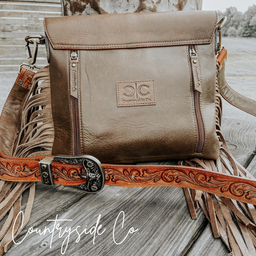 {{ brindle_boutique }} {{ online_boutique }} {{ jeans}} {{ brindle boutique }} {{ handbags }} {{ Native American jewelry }} {{ jewelry }} {{ cowhide}} {{ leather handbag}} {{ cowhide purse}} {{ turquoise}} {{ Navajo pearls }} {{ sterling silver}} {{ sterling silver pearls }} {{ necklace }} {{ bracelet }} {{ earrings }} {{ pendants }} {{ Navajo }} {{ cowhide tote }} {{ jeans }} {{ kan can }} {{ haute southern hyde }} {{ countryside co. }} {{ western }}