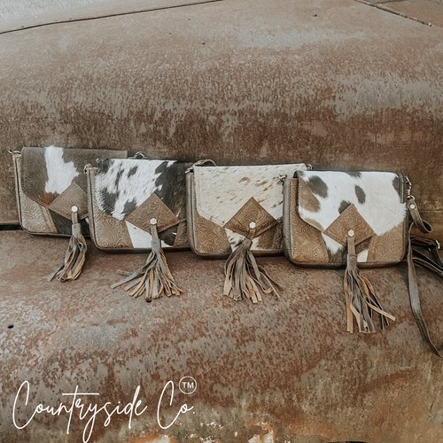 {{ brindle_boutique }} {{ online_boutique }} {{ jeans}} {{ brindle boutique }} {{ handbags }} {{ Native American jewelry }} {{ jewelry }} {{ cowhide}} {{ leather handbag}} {{ cowhide purse}} {{ turquoise}} {{ Navajo pearls }} {{ sterling silver}} {{ sterling silver pearls }} {{ necklace }} {{ bracelet }} {{ earrings }} {{ pendants }} {{ Navajo }} {{ cowhide tote }} {{ jeans }} {{ kan can }} {{ haute southern hyde }} {{ countryside co. }} {{ western }}