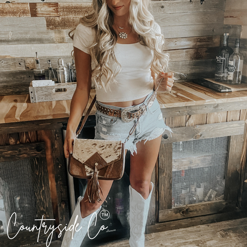 {{ brindle_boutique }} {{ online_boutique }} {{ jeans}} {{ brindle boutique }} {{ handbags }} {{ Native American jewelry }} {{ jewelry }} {{ cowhide}} {{ leather handbag}} {{ cowhide purse}} {{ turquoise}} {{ Navajo pearls }} {{ sterling silver}} {{ sterling silver pearls }} {{ necklace }} {{ bracelet }} {{ earrings }} {{ pendants }} {{ Navajo }} {{ cowhide tote }} {{ jeans }} {{ kan can }} {{ haute southern hyde }} {{ countryside co. }} {{ western }}