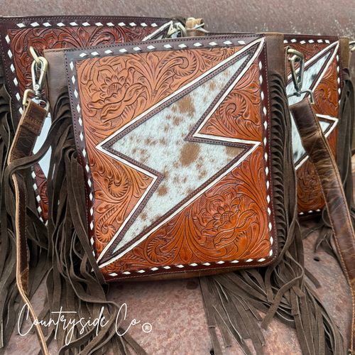 {{ brindle_boutique }} {{ online_boutique }} {{ jeans}} {{ brindle boutique }} {{ handbags }} {{ Native American jewelry }} {{ jewelry }} {{ cowhide}} {{ leather handbag}} {{ cowhide purse}} {{ turquoise}} {{ Navajo pearls }} {{ sterling silver}} {{ sterling silver pearls }} {{ necklace }} {{ bracelet }} {{ earrings }} {{ pendants }} {{ Navajo }} {{ cowhide tote }} {{ jeans }} {{ kan can }} {{ haute southern hyde }} {{ countryside co. }} {{ western }}