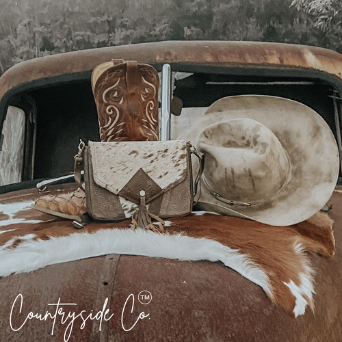 {{ brindle_boutique }} {{ online_boutique }} {{ jeans}} {{ brindle boutique }} {{ handbags }} {{ Native American jewelry }} {{ jewelry }} {{ cowhide}} {{ leather handbag}} {{ cowhide purse}} {{ turquoise}} {{ Navajo pearls }} {{ sterling silver}} {{ sterling silver pearls }} {{ necklace }} {{ bracelet }} {{ earrings }} {{ pendants }} {{ Navajo }} {{ cowhide tote }} {{ jeans }} {{ kan can }} {{ haute southern hyde }} {{ countryside co. }} {{ western }}