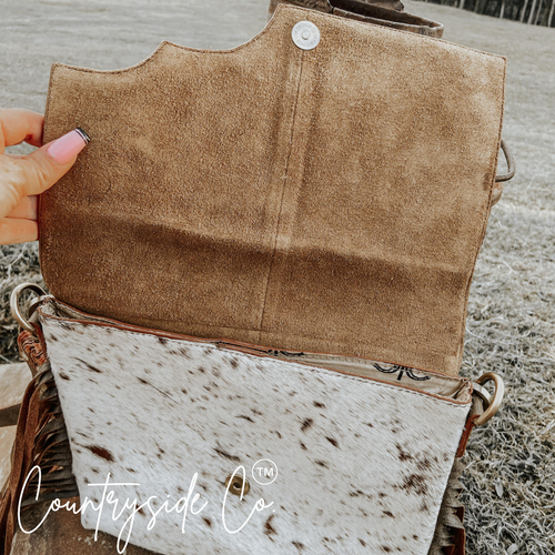 {{ brindle_boutique }} {{ online_boutique }} {{ jeans}} {{ brindle boutique }} {{ handbags }} {{ Native American jewelry }} {{ jewelry }} {{ cowhide}} {{ leather handbag}} {{ cowhide purse}} {{ turquoise}} {{ Navajo pearls }} {{ sterling silver}} {{ sterling silver pearls }} {{ necklace }} {{ bracelet }} {{ earrings }} {{ pendants }} {{ Navajo }} {{ cowhide tote }} {{ jeans }} {{ kan can }} {{ haute southern hyde }} {{ countryside co. }} {{ western }}