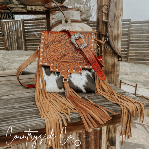 {{ brindle_boutique }} {{ online_boutique }} {{ jeans}} {{ brindle boutique }} {{ handbags }} {{ Native American jewelry }} {{ jewelry }} {{ cowhide}} {{ leather handbag}} {{ cowhide purse}} {{ turquoise}} {{ Navajo pearls }} {{ sterling silver}} {{ sterling silver pearls }} {{ necklace }} {{ bracelet }} {{ earrings }} {{ pendants }} {{ Navajo }} {{ cowhide tote }} {{ jeans }} {{ kan can }} {{ haute southern hyde }} {{ countryside co. }} {{ western }}