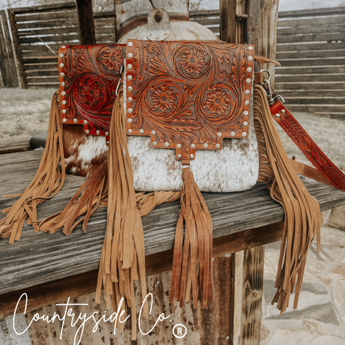 {{ brindle_boutique }} {{ online_boutique }} {{ jeans}} {{ brindle boutique }} {{ handbags }} {{ Native American jewelry }} {{ jewelry }} {{ cowhide}} {{ leather handbag}} {{ cowhide purse}} {{ turquoise}} {{ Navajo pearls }} {{ sterling silver}} {{ sterling silver pearls }} {{ necklace }} {{ bracelet }} {{ earrings }} {{ pendants }} {{ Navajo }} {{ cowhide tote }} {{ jeans }} {{ kan can }} {{ haute southern hyde }} {{ countryside co. }} {{ western }}