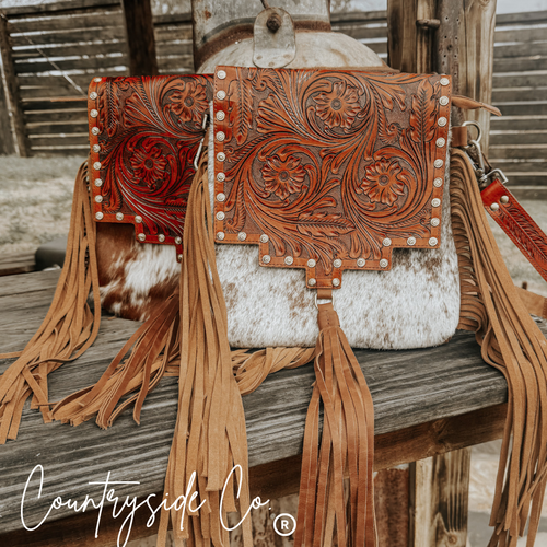 {{ brindle_boutique }} {{ online_boutique }} {{ jeans}} {{ brindle boutique }} {{ handbags }} {{ Native American jewelry }} {{ jewelry }} {{ cowhide}} {{ leather handbag}} {{ cowhide purse}} {{ turquoise}} {{ Navajo pearls }} {{ sterling silver}} {{ sterling silver pearls }} {{ necklace }} {{ bracelet }} {{ earrings }} {{ pendants }} {{ Navajo }} {{ cowhide tote }} {{ jeans }} {{ kan can }} {{ haute southern hyde }} {{ countryside co. }} {{ western }}