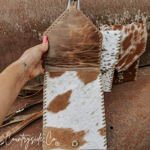 {{ brindle_boutique }} {{ online_boutique }} {{ jeans}} {{ brindle boutique }} {{ handbags }} {{ Native American jewelry }} {{ jewelry }} {{ cowhide}} {{ leather handbag}} {{ cowhide purse}} {{ turquoise}} {{ Navajo pearls }} {{ sterling silver}} {{ sterling silver pearls }} {{ necklace }} {{ bracelet }} {{ earrings }} {{ pendants }} {{ Navajo }} {{ cowhide tote }} {{ jeans }} {{ kan can }} {{ haute southern hyde }} {{ countryside co. }} {{ western }}