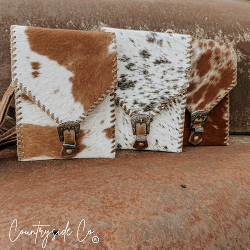 {{ brindle_boutique }} {{ online_boutique }} {{ jeans}} {{ brindle boutique }} {{ handbags }} {{ Native American jewelry }} {{ jewelry }} {{ cowhide}} {{ leather handbag}} {{ cowhide purse}} {{ turquoise}} {{ Navajo pearls }} {{ sterling silver}} {{ sterling silver pearls }} {{ necklace }} {{ bracelet }} {{ earrings }} {{ pendants }} {{ Navajo }} {{ cowhide tote }} {{ jeans }} {{ kan can }} {{ haute southern hyde }} {{ countryside co. }} {{ western }}